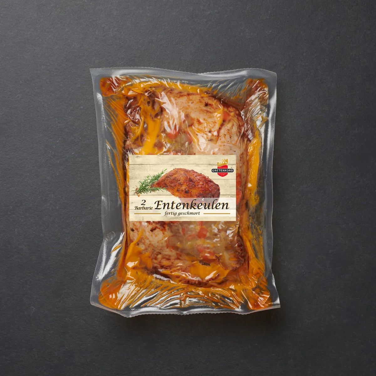Zwei Sous Vide gegarte Entenkeulen verpackt.