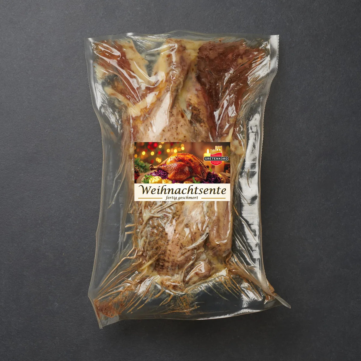 1/2 gegarte Weihnachtsente verpackt.